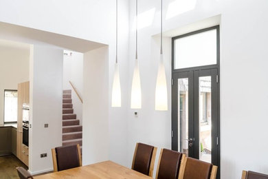 This is an example of a contemporary dining room in Edinburgh.