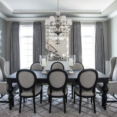 Elegant dark wood floor dining room photo in Chicago with gray walls and no fireplace