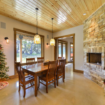 Beautiful Hill Country Dining Room with corner firepalce
