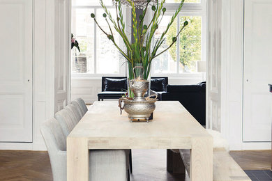 Example of a transitional dining room design in Amsterdam