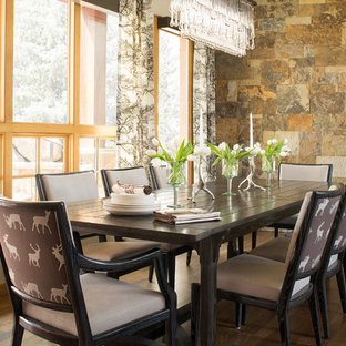 Inspiration for a rustic dark wood floor dining room remodel in Denver