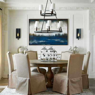 Kitchen/dining room combo - mid-sized mediterranean medium tone wood floor kitchen/dining room combo idea in Orlando with white walls and no fireplace