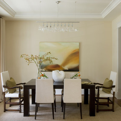 Trendy dark wood floor enclosed dining room photo in DC Metro with beige walls
