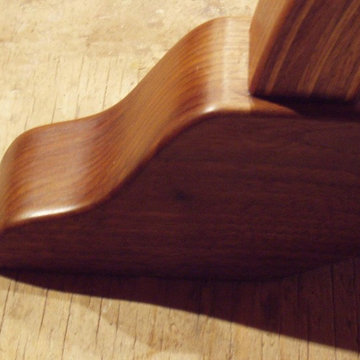 Black walnut trestle table foot (detail).
