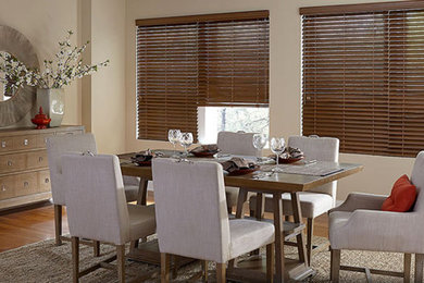 Mid-sized transitional dark wood floor and brown floor enclosed dining room photo in Los Angeles with beige walls
