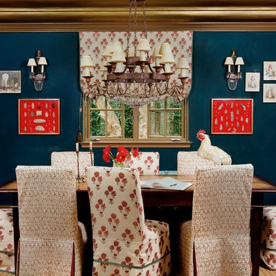 Enclosed dining room - large eclectic carpeted enclosed dining room idea in New York with blue walls