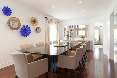 Example of a trendy dining room design