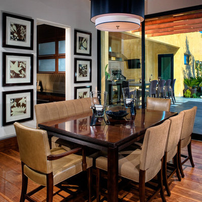 Trendy dining room photo in Las Vegas with white walls