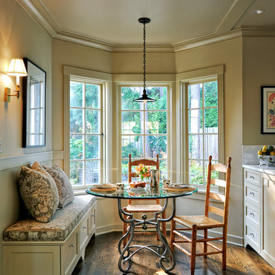 Example of a mid-sized classic dark wood floor kitchen/dining room combo design in Seattle with beige walls and no fireplace