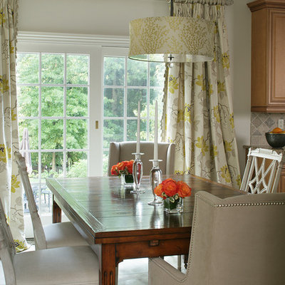 Example of a mid-sized classic beige floor kitchen/dining room combo design in New York with beige walls and no fireplace