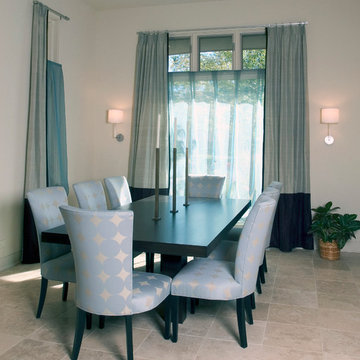 Breakfast Room with Limestone Tile Floors and Floor to Ceiling Windows