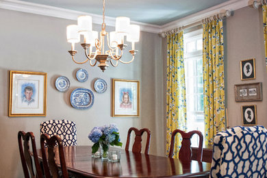 Photo of a large traditional enclosed dining room in Charlotte with grey walls, medium hardwood flooring and no fireplace.