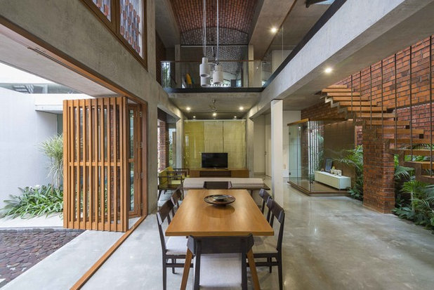 Transitional Dining Room by Architecture Paradigm