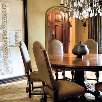Tuscan enclosed dining room photo in Atlanta with beige walls
