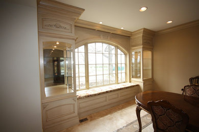 Example of a large classic kitchen/dining room combo design in Other with beige walls