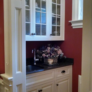 Butler Pantry with sink and storage.