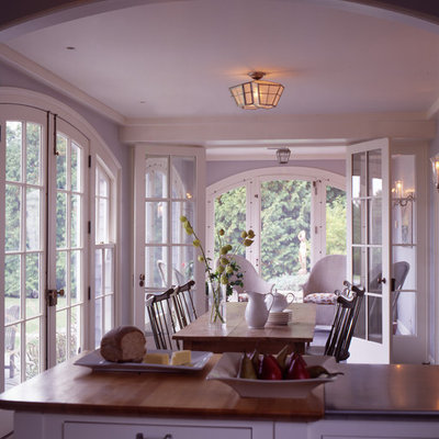 Example of a mid-sized beach style dining room design in Boston