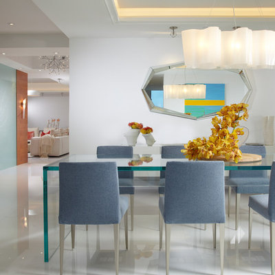 Large trendy marble floor and white floor kitchen/dining room combo photo in Miami with white walls