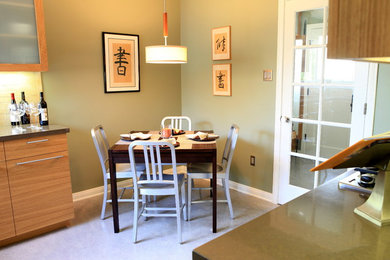 Mid-sized transitional linoleum floor enclosed dining room photo in Los Angeles with green walls and no fireplace