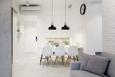 Immagine di una sala da pranzo moderna di medie dimensioni con pareti bianche e pavimento con piastrelle in ceramica