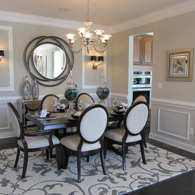 Inspiration for a contemporary brown floor dining room remodel in Boston with gray walls