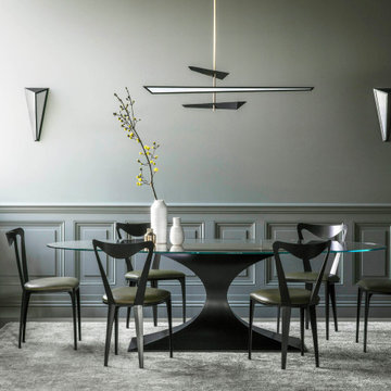 Capricorn Oval Dining Table with clear glass top