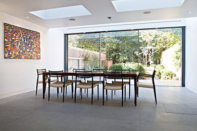 Large contemporary open plan dining room in London.