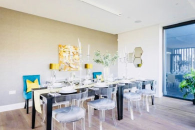 This is an example of a contemporary dining room in Dorset.