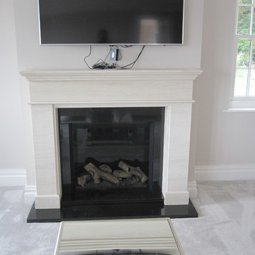 Changing the look of the fireplace by removing the wall hung TV -  replacing wit