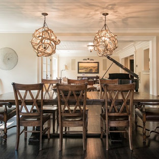 Mid-sized beach style dark wood floor enclosed dining room photo in New York with beige walls and no fireplace