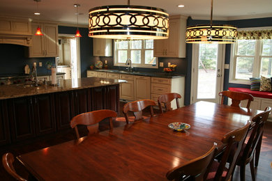 Example of a classic dining room design in Other