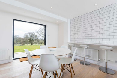 Inspiration for a contemporary dining room in Hampshire.