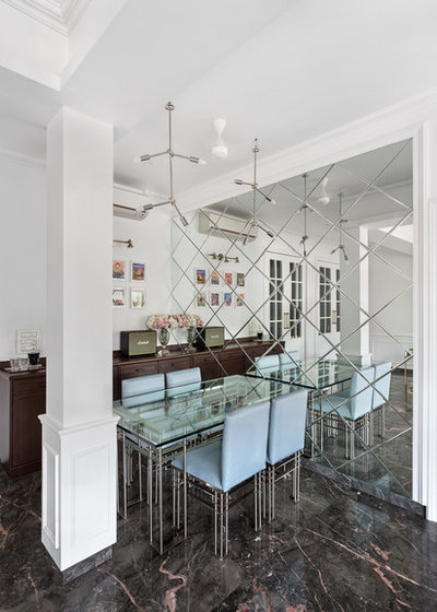 Contemporary Dining Room by Essajees Atelier