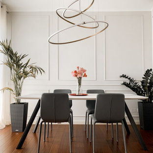 Foto di una sala da pranzo design di medie dimensioni con parquet scuro