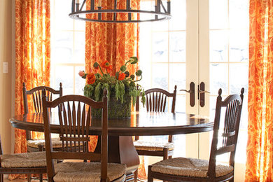 Dining room - traditional dining room idea in New York with beige walls