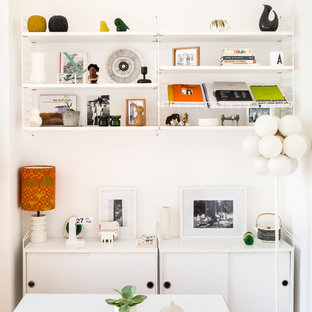 Scandi dining room in London with white walls and no fireplace.
