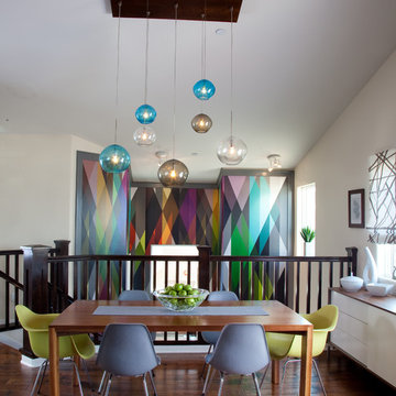 Colorful stairwell, dining and living area