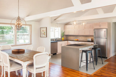 Photo of a contemporary open plan dining room in Boston.