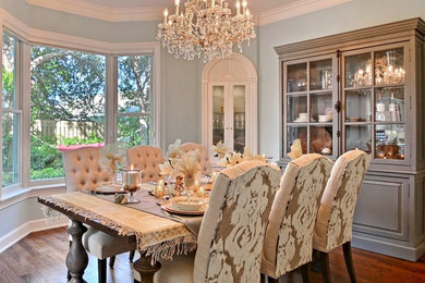 Example of a cottage chic dining room design in Miami