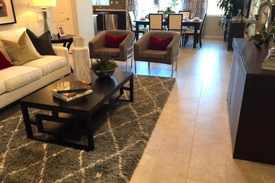Inspiration for a transitional travertine floor and beige floor great room remodel in Los Angeles