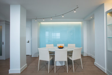 Dining room - contemporary dining room idea in DC Metro with blue walls
