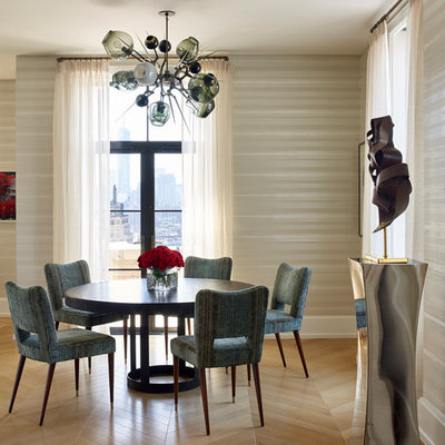 Trendy light wood floor dining room photo in New York with beige walls
