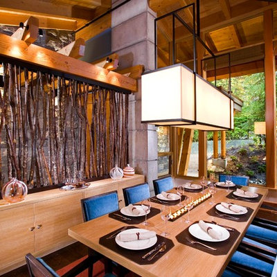 Trendy dark wood floor dining room photo in Vancouver