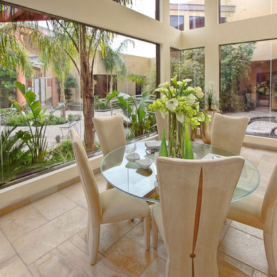 Dining room - contemporary dining room idea in Las Vegas with white walls
