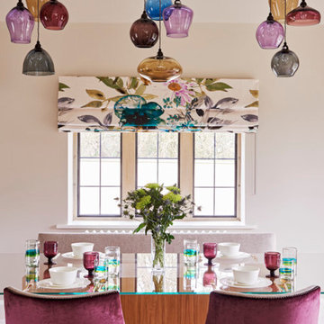 Contemporary dining room with multi pendant lights