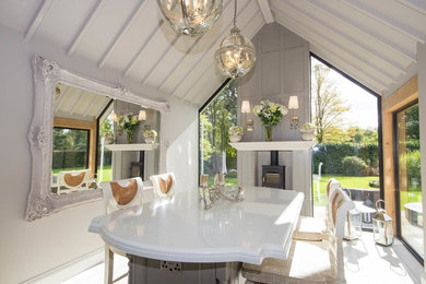 Inspiration for a medium sized traditional enclosed dining room in Cheshire with grey walls.