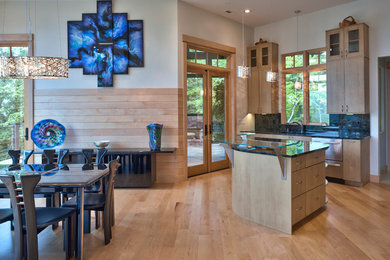 Inspiration for a transitional medium tone wood floor kitchen/dining room combo remodel in Other with gray walls