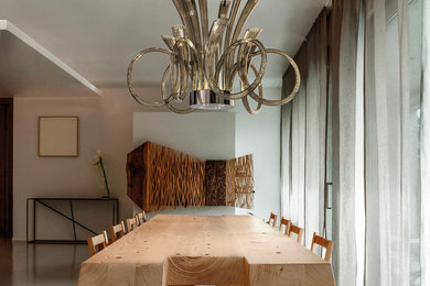 Immagine di una sala da pranzo aperta verso il soggiorno contemporanea di medie dimensioni con pareti bianche, nessun camino e pavimento bianco