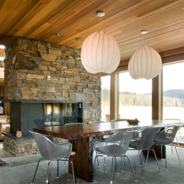 Continental Divide - Colorado Modern Mountain Home Dining Room with Fireplace