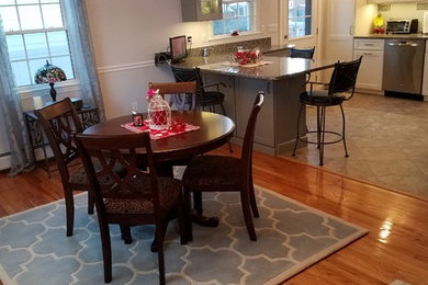 Kitchen/dining room combo - mid-sized traditional light wood floor and beige floor kitchen/dining room combo idea in Boston with beige walls and no fireplace